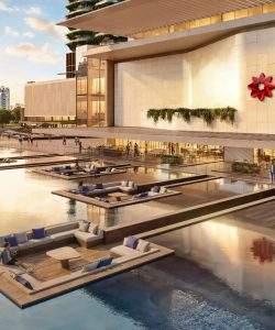Render oficial da expansão do Flamboyant Shopping em Goiânia, com espelho d'água e lounges